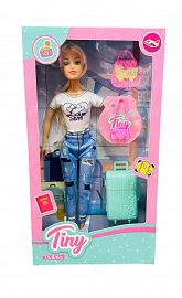 TINY MUÑECA VIAJERA